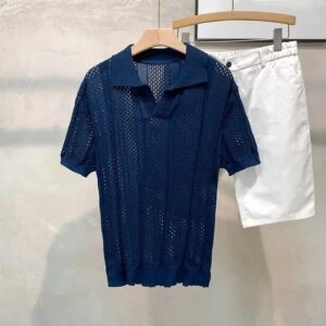 Le Polo — maille ajourée, bleu marine